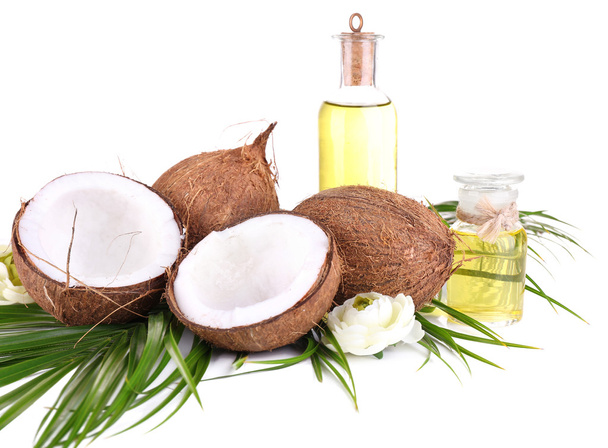 Coconuts and coconut oil, isolated on white - Zdjęcie, obraz