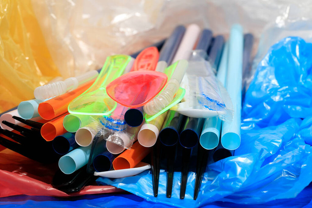 Plastic disposable items are comfortable and easy to use but the material they are made of seriously pollutes the environment. - Photo, Image