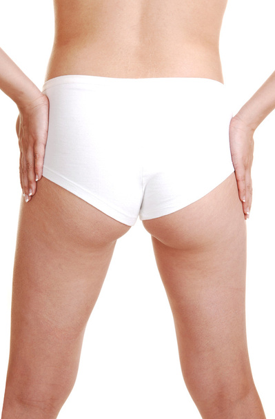 La parte posteriore di una ragazza in un panty bianco
. - Foto, immagini