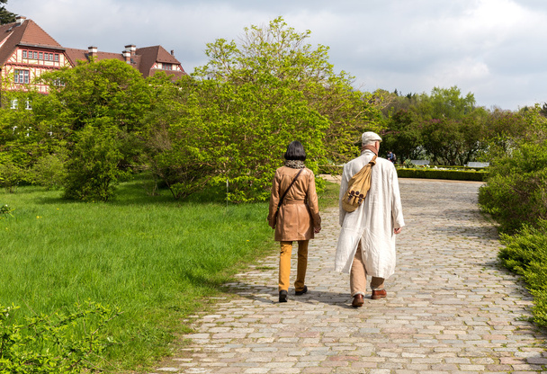 Senior couple enjoying a Sunday stroll - Photo, Image