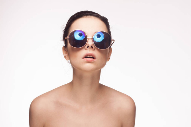 attractive woman naked shoulders sunglasses charm light background - Photo, Image
