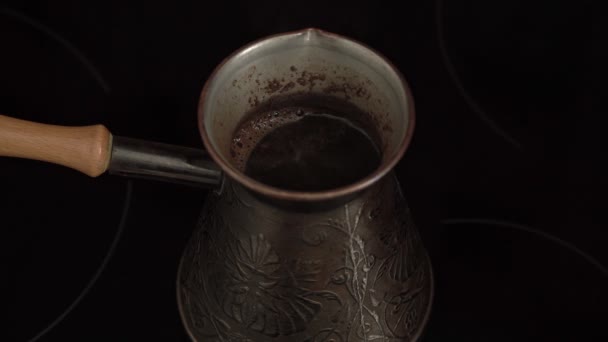 Turk for making coffee, close-up. Cezva, the process of brewing coffee - Video