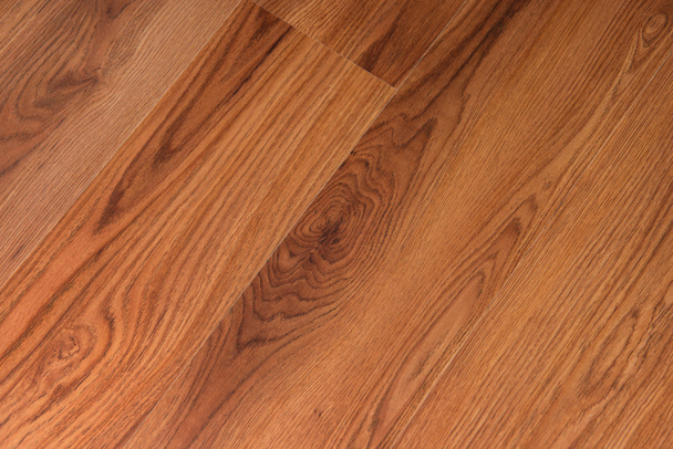 фон ярко-коричневый, деревянный пол, вид сверху - Фото, изображение