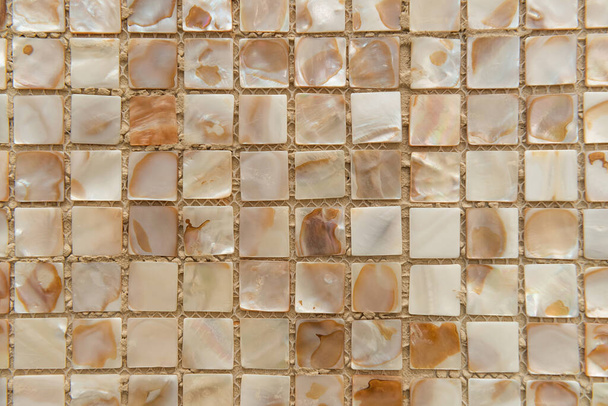 nacreous beige tegels achtergrond, bovenaanzicht - Foto, afbeelding