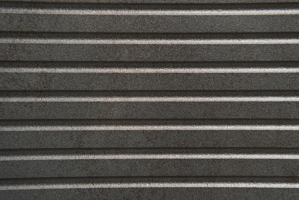 background of dark grey, metallic siding, top view - Фото, зображення