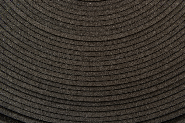 pozadí černého, protlačovaného polystyrenu, horní pohled - Fotografie, Obrázek