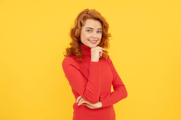 cheerful lady with curly hair. beauty and fashion. female fashion model. pretty look of young smiling girl. red haired woman. happy redhead woman on yellow background. express positive emotions. - Photo, Image
