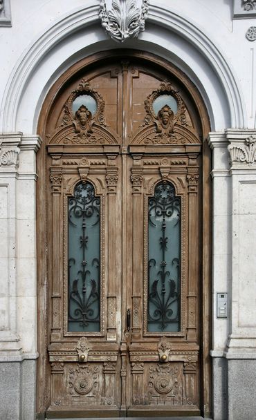 Wooden ornate door in Valladolid, Castilla y Leon, Spain - Foto, Bild