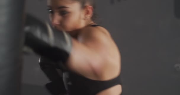 girl punch boxing bag - Footage, Video
