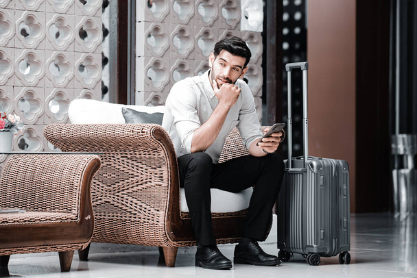 Handsome young bearded businessman with mobile phone - Φωτογραφία, εικόνα