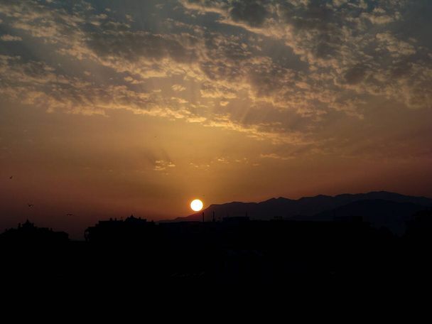 プラヤグラナダの夕日。夕日の風景 - 写真・画像