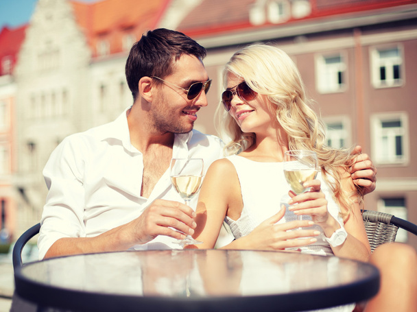 Couple drinking wine in cafe - Photo, Image
