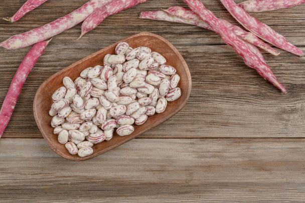 closeup fresh kidney beans on the wooden table with copy space - Photo, Image
