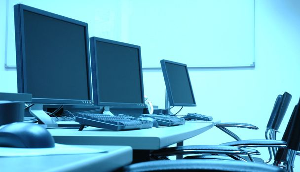 Photo of blue screens in computer room, business concept - Photo, Image