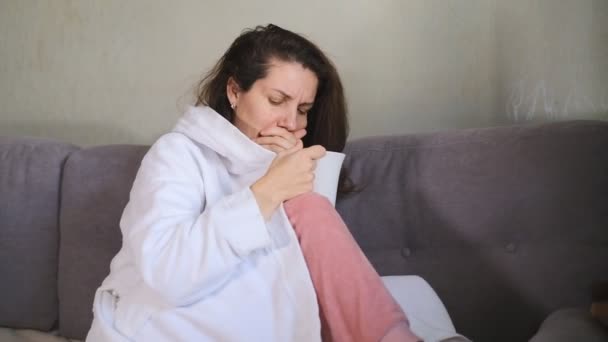 Reinfection with COVID-19. The third wave of coronavirus in Europe. Manifestation of symptoms of coronavirus in a woman. Home treatment. - Footage, Video