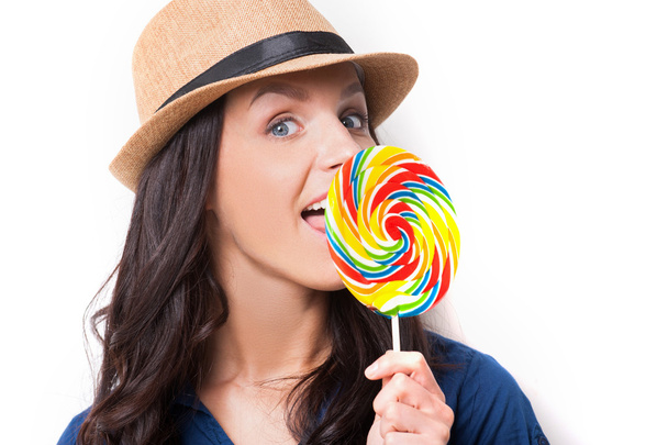 Woman licking a big lollipop - Fotó, kép