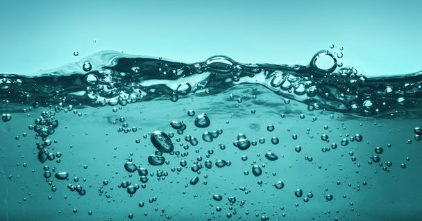 Many bubbles in water - Foto, afbeelding