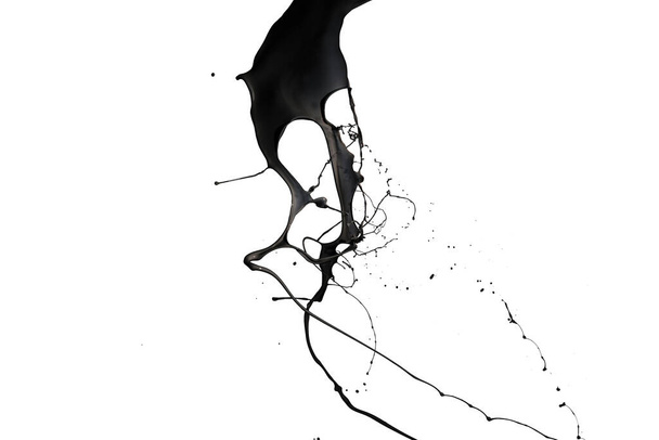 Black paint splash isolated on white background. - Photo, Image