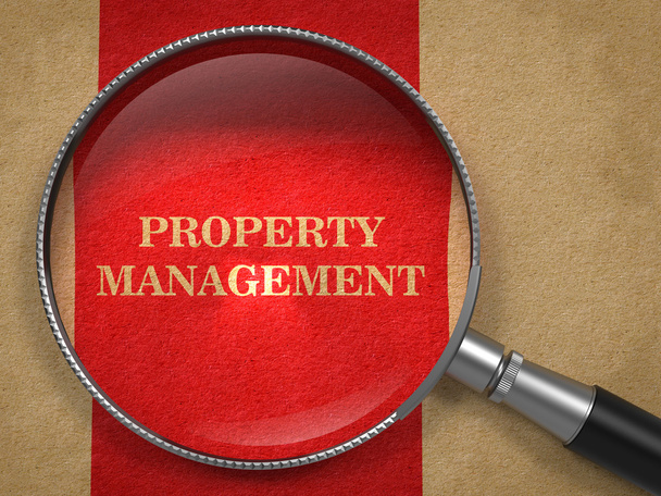 Property Management. Lupe auf altem Papier. - Foto, Bild