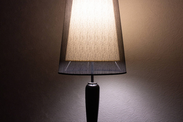 Floor lamp on wall background in night - Photo, Image
