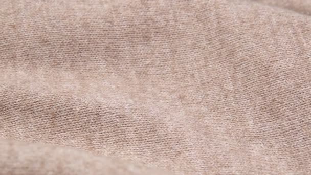 chaqueta marrón chaqueta de lana tela primer plano macro. control deslizante, movimiento de la cámara - Imágenes, Vídeo