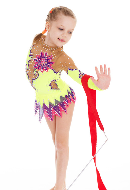 Adorable little gymnast dancing with ribbon - Photo, Image