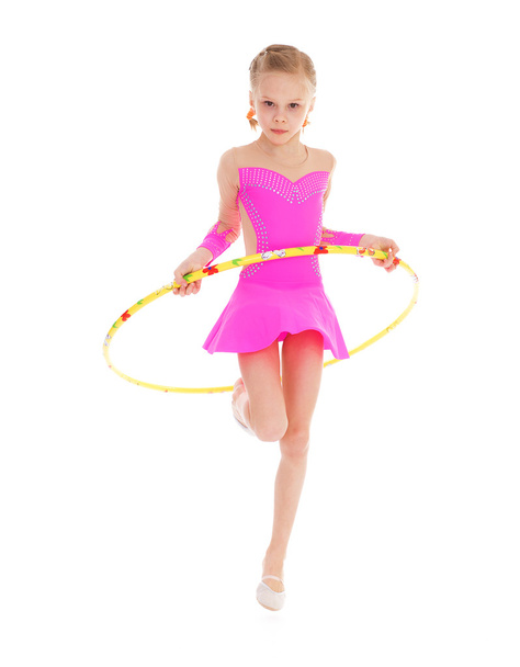 Beautiful little gymnast with the hoop - Foto, Imagen