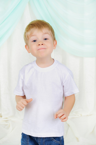 Portrait of a young boy on a white background. - Fotoğraf, Görsel