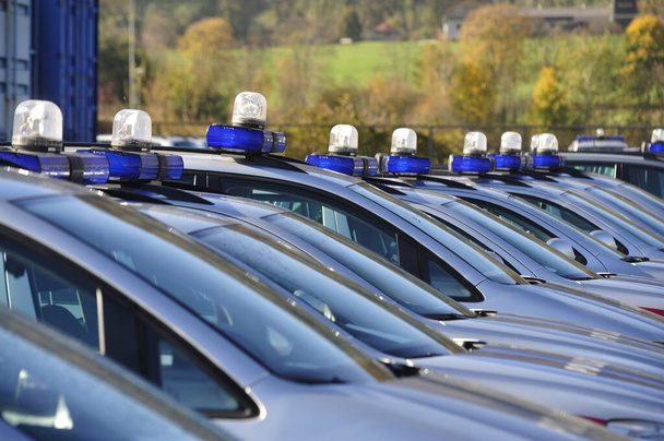 Policejní vozidla ve vozovém parku, doprava a mobilita v silniční dopravě - Fotografie, Obrázek