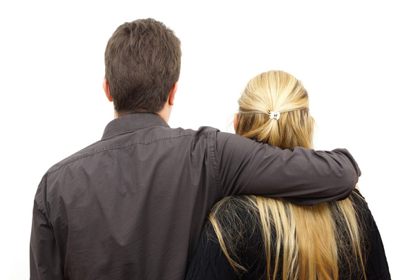 Back view of young couple (man and woman) hug - Foto, imagen