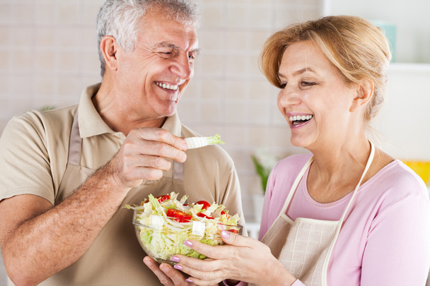 Senior Couple in the kitchen - Фото, изображение