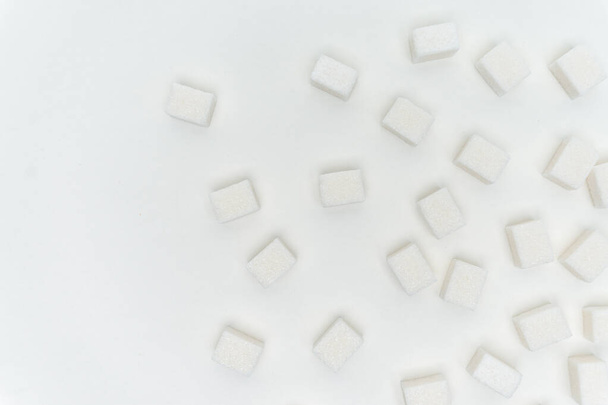cubetti di zucchero su fondo chiaro Ingrediente di glucosio - Foto, immagini