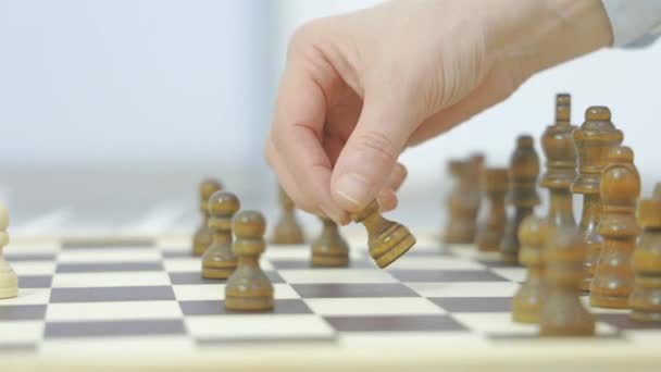 Hand of woman with chess piece - Footage, Video