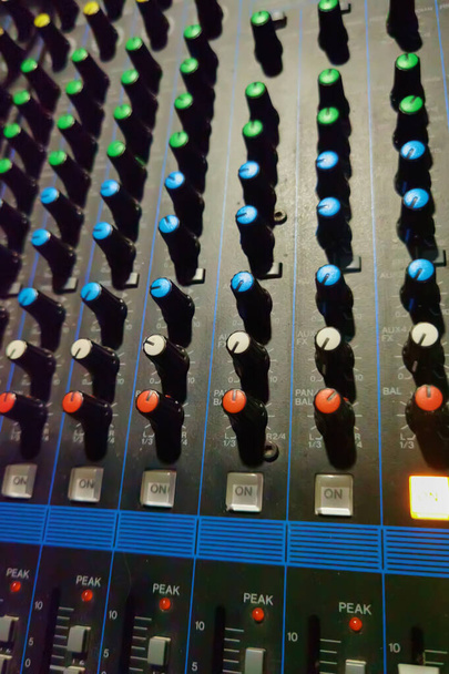 Professional sound and audio mixer control panel with buttons. Shallow dof - Fotografie, Obrázek