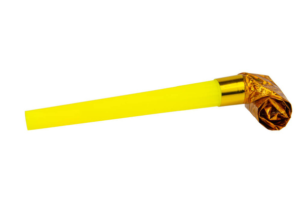 Rolled gold foil festive noisemaker or party whistle horn isolated on the white background - Φωτογραφία, εικόνα