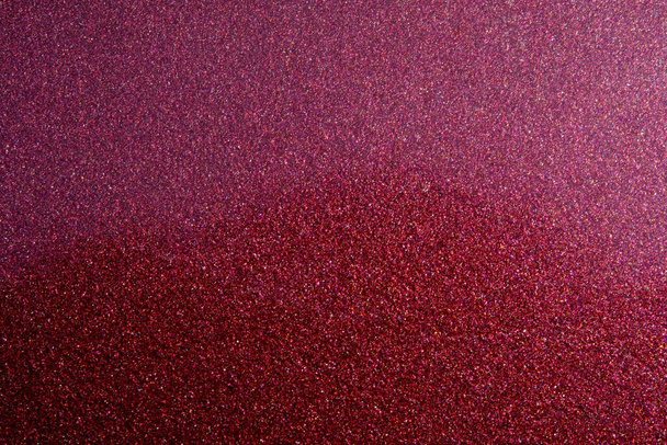 Macro fotografia astratta. Texture glitter su superficie in acciaio rosso - Foto, immagini