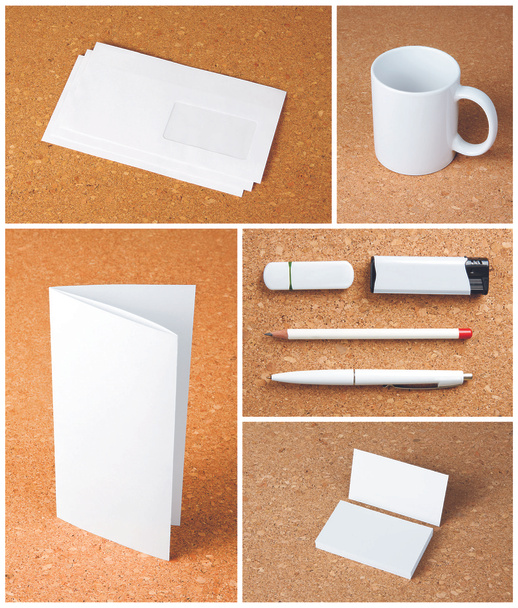 White collection of stationery on corkboard background. - Foto, afbeelding