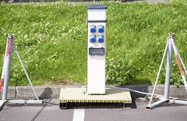 Electric recharging point for vehicle car or bike free no charge in car parking space - Photo, Image