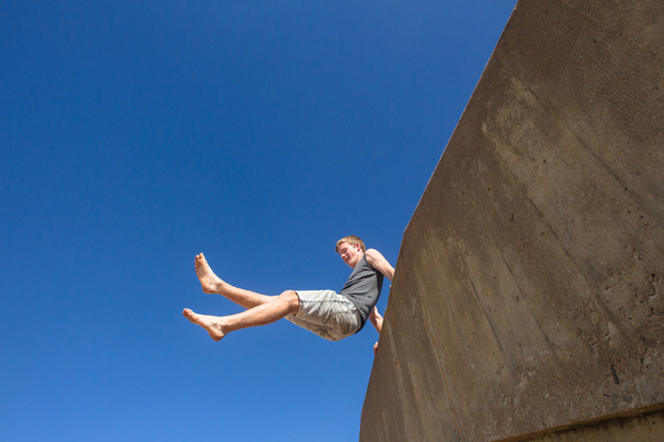 Teen Boy Jumping Blue Sky Parkour - Fotó, kép