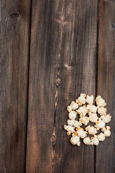 popcorn on a wooden table enjoyment rest meal snack - Zdjęcie, obraz
