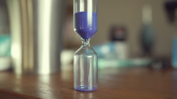 flipping hourglass on a table - Footage, Video