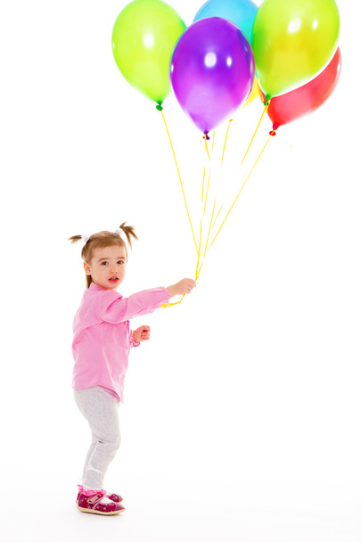 girl with balloons. - Foto, afbeelding