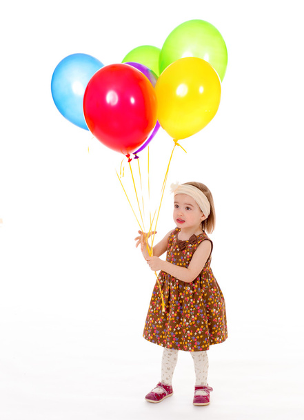 girl with balloons. - Φωτογραφία, εικόνα
