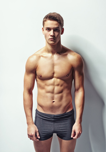 Portrait of a young muscular man - Foto, imagen