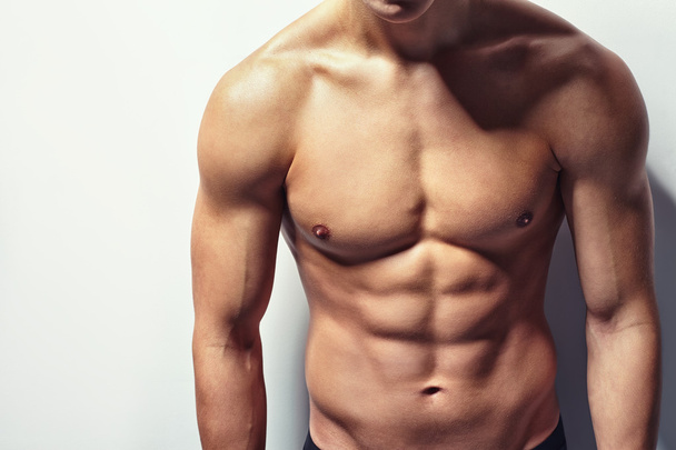 Muscular torso of young man - Foto, imagen