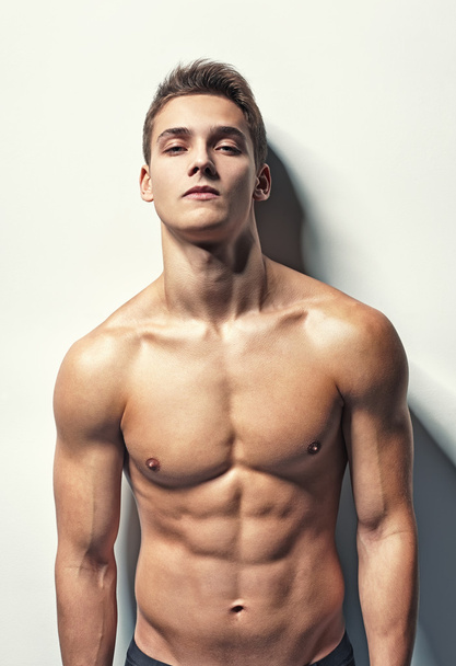 Portrait of young muscular man - Photo, Image