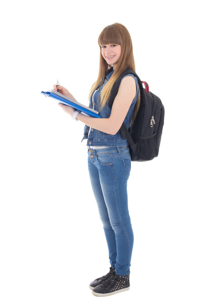 teenage girl writing in notebook isolated on white - Photo, Image