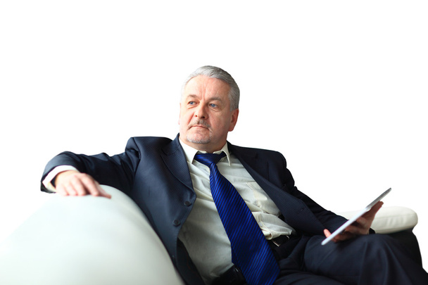Portrait of a mature businessman with digital tablet - Foto, afbeelding