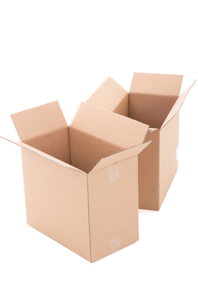 two open brown corrugated cardboard boxes over white  - Photo, image