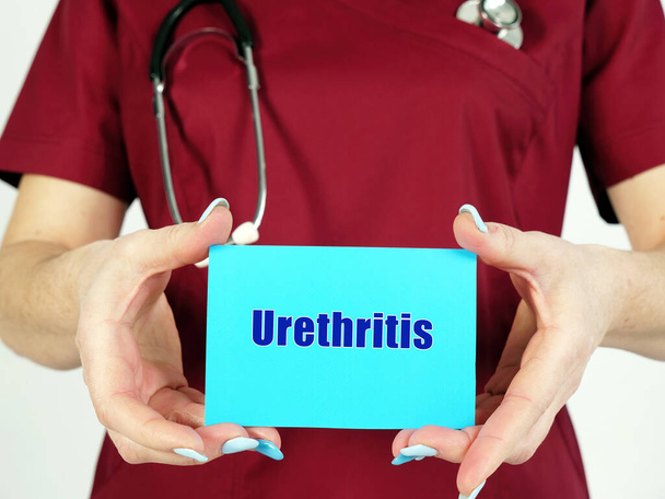 Orvosi fogalom Urethritis mondattal a darab papíron - Fotó, kép